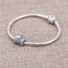 Charm berloques PANDORA Laço Coração - 791776CZ