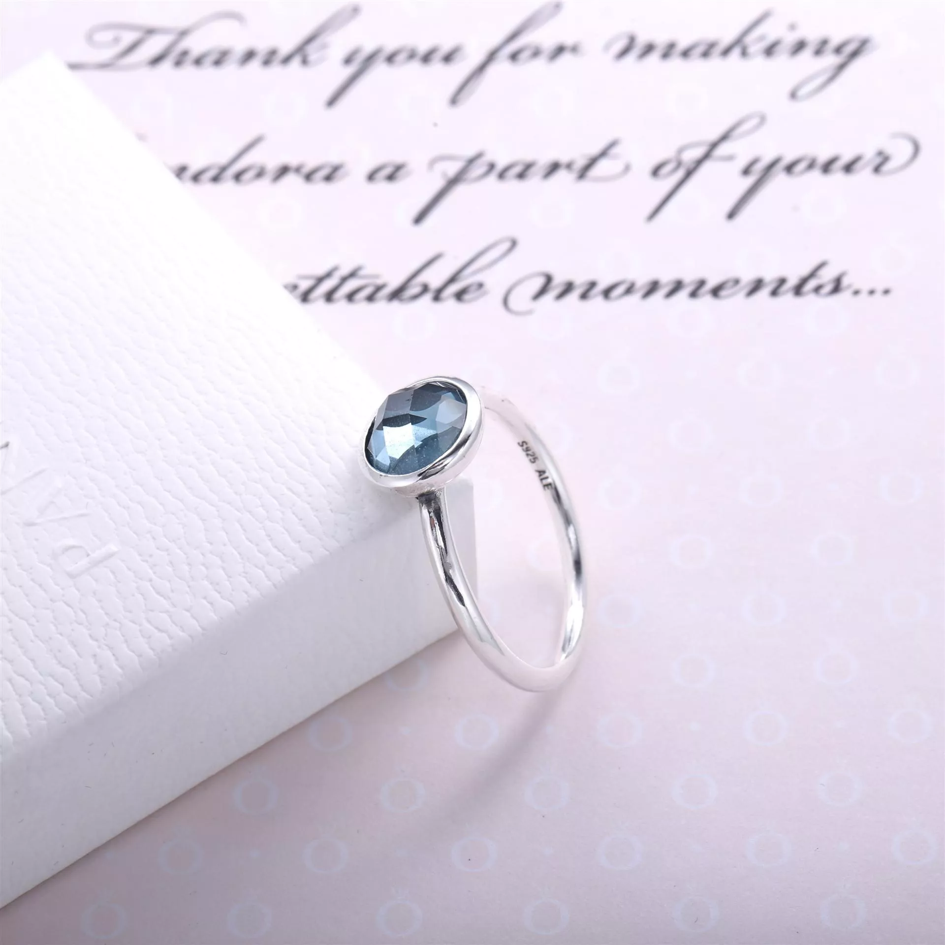 Anel PANDORA Gota de Cristal Azul-Água - Março - 191012NAB